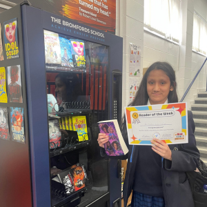 Photo of a student studying a book