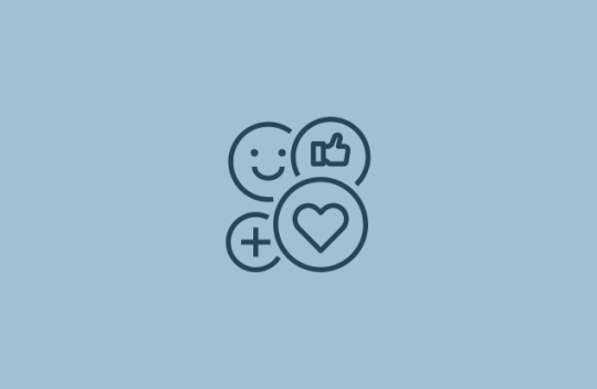 Icon of a smiley face emoji, a thumbs up emoji and a heart emoji 