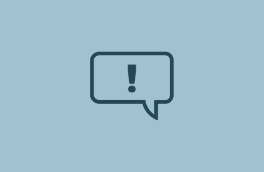 Icon of a speech bubble filled with an exclamation mark