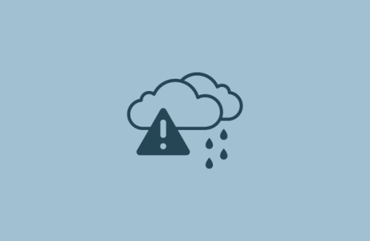 An icon of clouds, rain and a exclamation mark